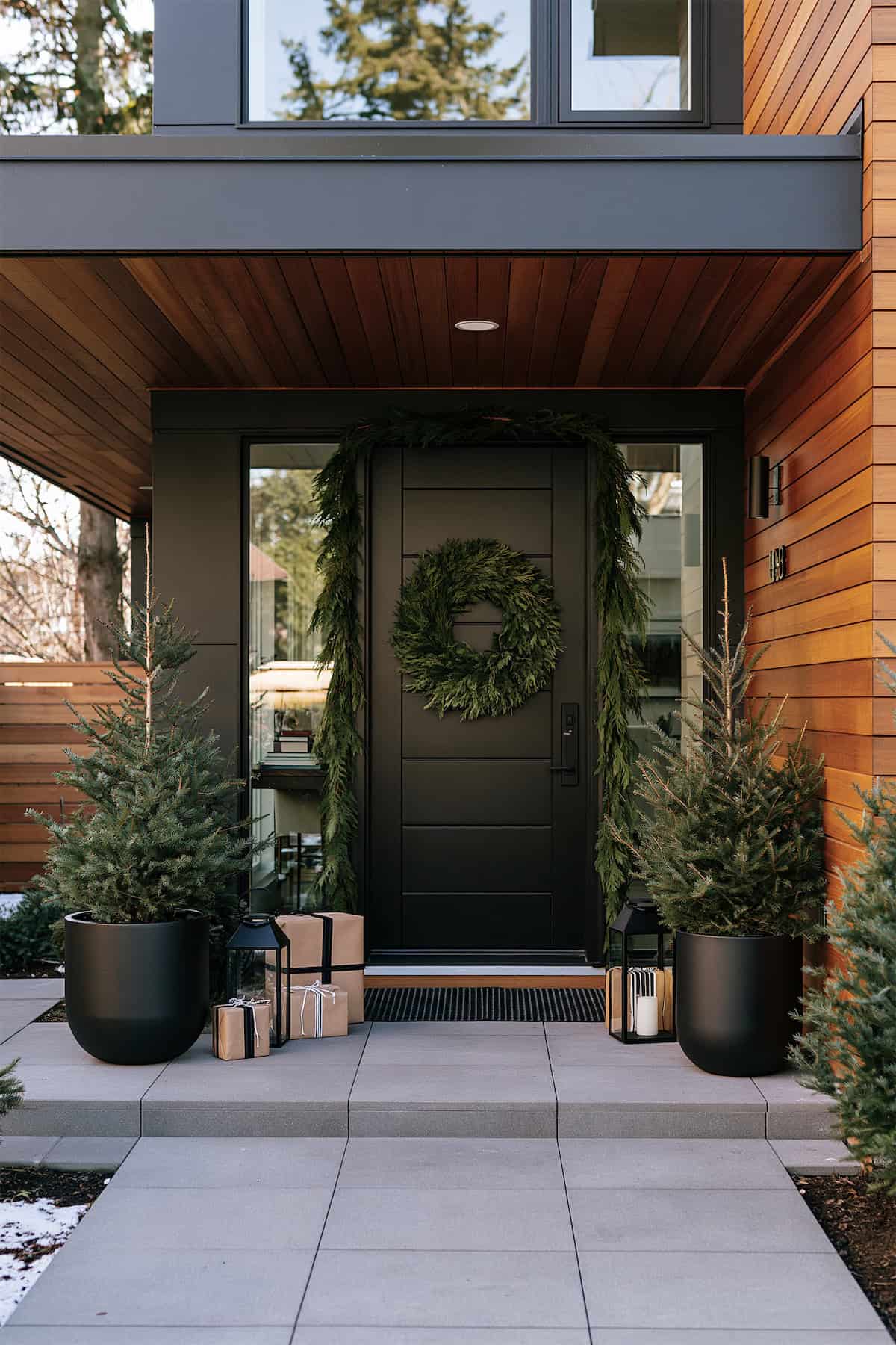 Black Planters for a Modern Christmas Entry