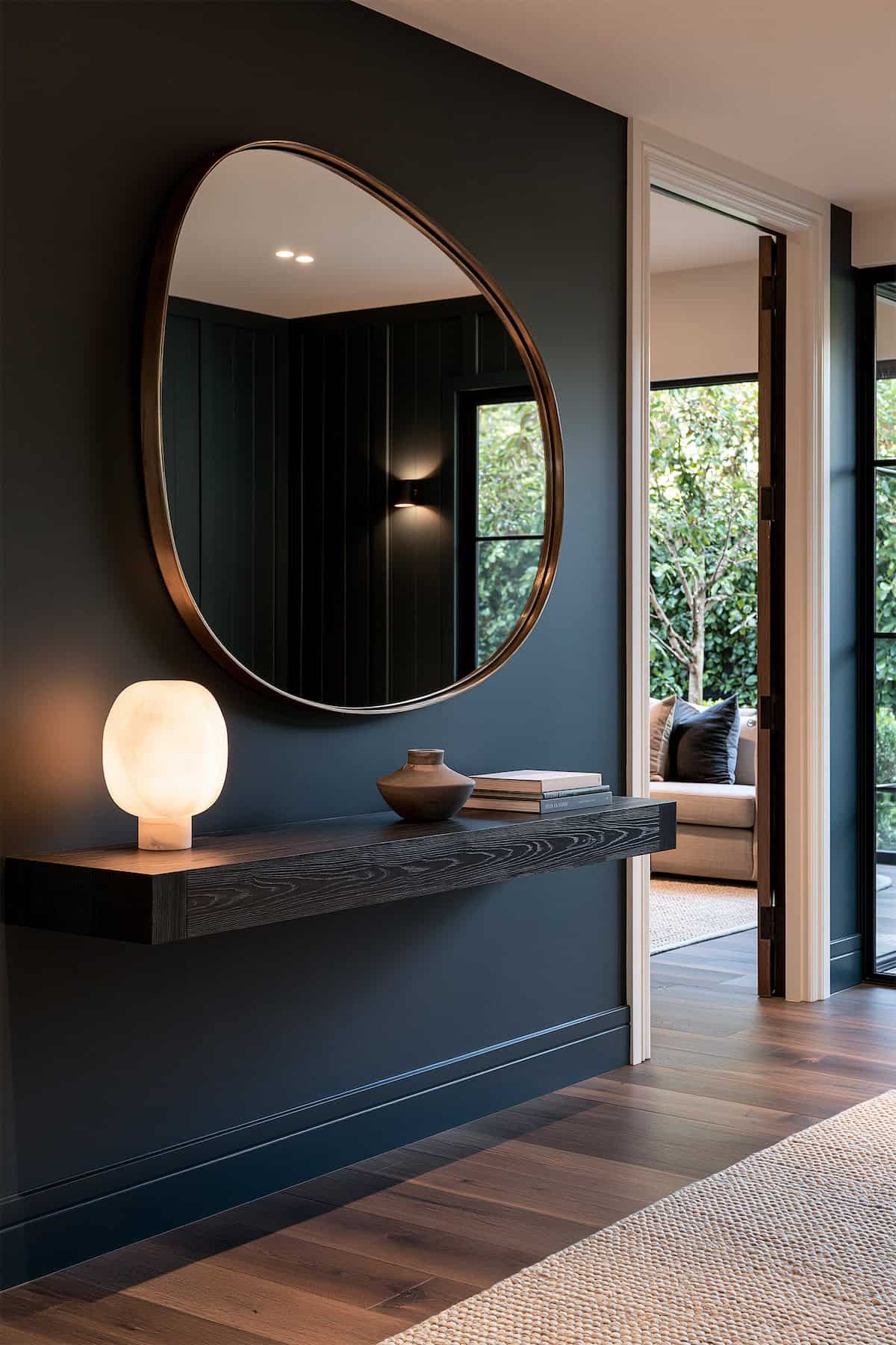 Irregular Brass Mirror on Dark Walls