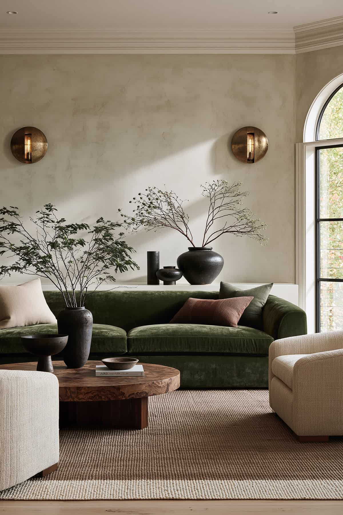 Moss Green Velvet Sofa and Plaster Walls