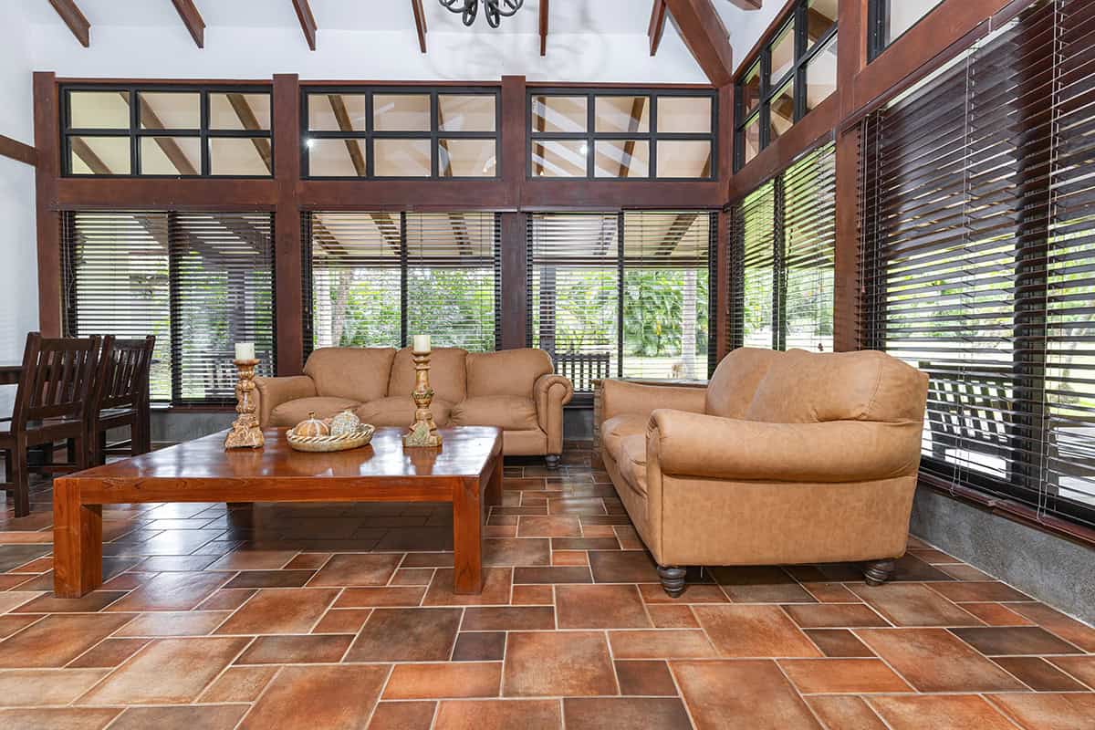 Terracotta Floors With Warm Wood Details