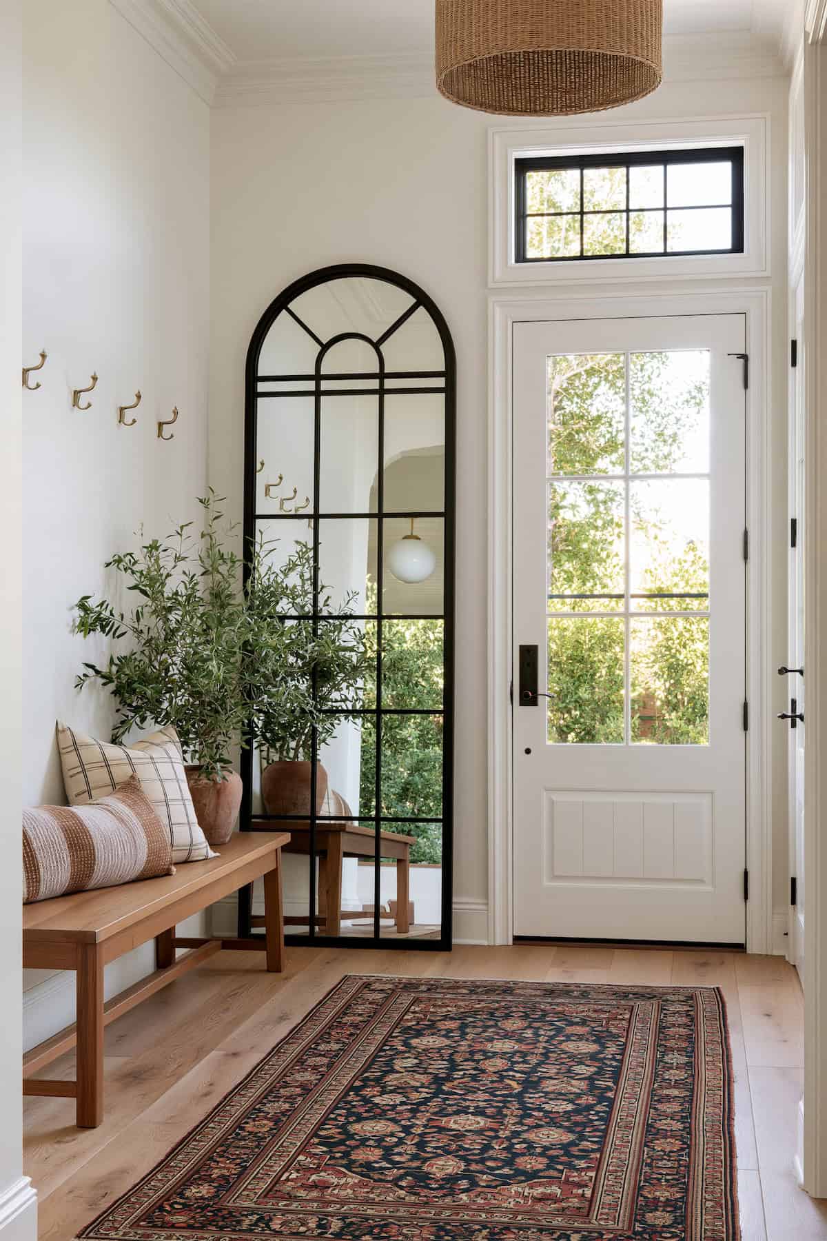 Entryway Depth From an Arched Windowpane Mirror