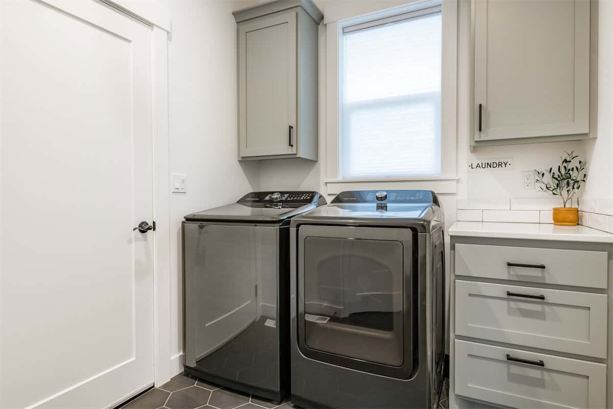 A Window Between Laundry Closet Cabinets